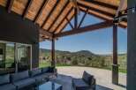 Experience luxury living with this stunning property featuring a spacious outdoor patio.