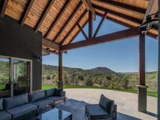 Experience luxury living with this stunning property featuring a spacious outdoor patio.
