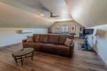 This stunning property boasts a spacious loft area, perfect for relaxation and entertainment.