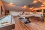 This stunning property boasts a spacious game room, perfect for entertaining guests or enjoying quality time with family.