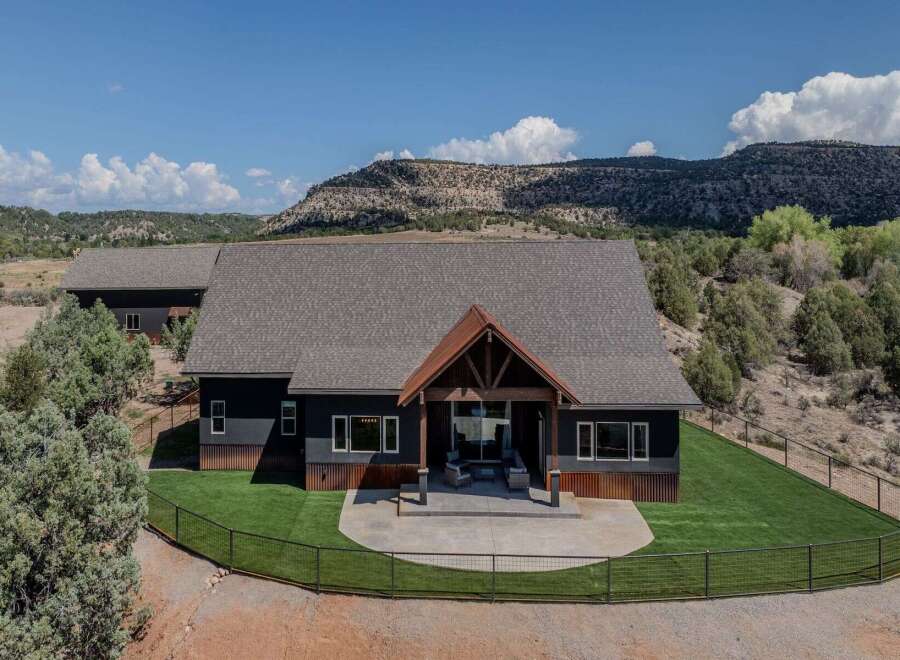 This stunning property boasts a modern design with a touch of rustic charm, offering a perfect blend of luxury and comfort.