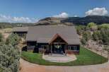 This stunning property boasts a modern design with a touch of rustic charm, offering a perfect blend of luxury and comfort.