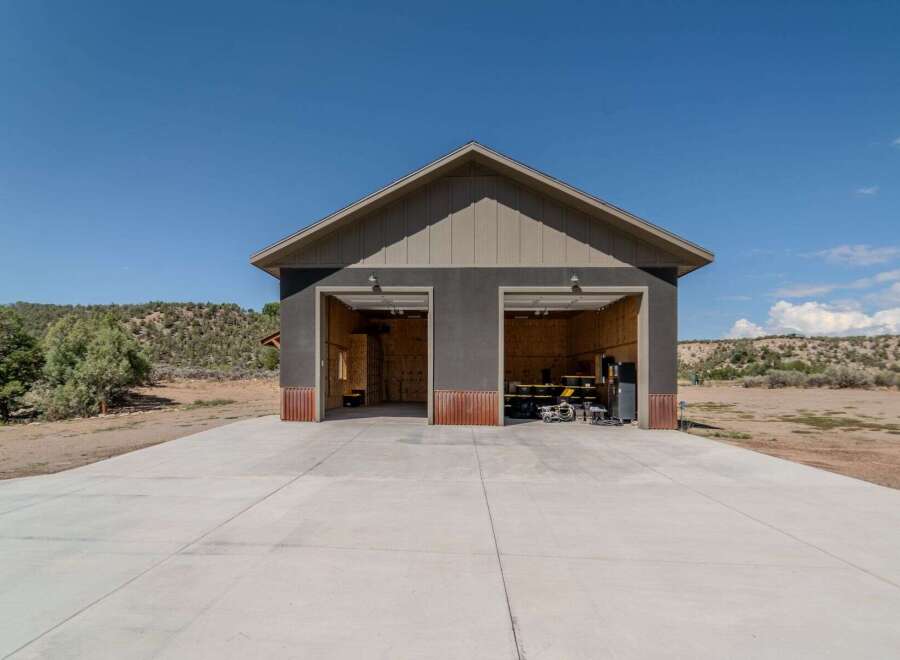 Discover this stunning property featuring a spacious two-car garage, perfect for car enthusiasts or extra storage.