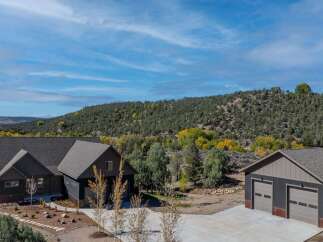 Discover your dream home nestled in a serene natural setting.