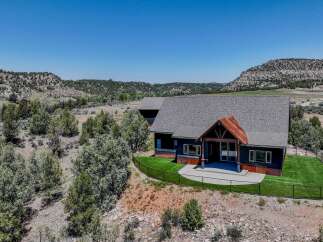 Discover your dream home nestled in a serene landscape.