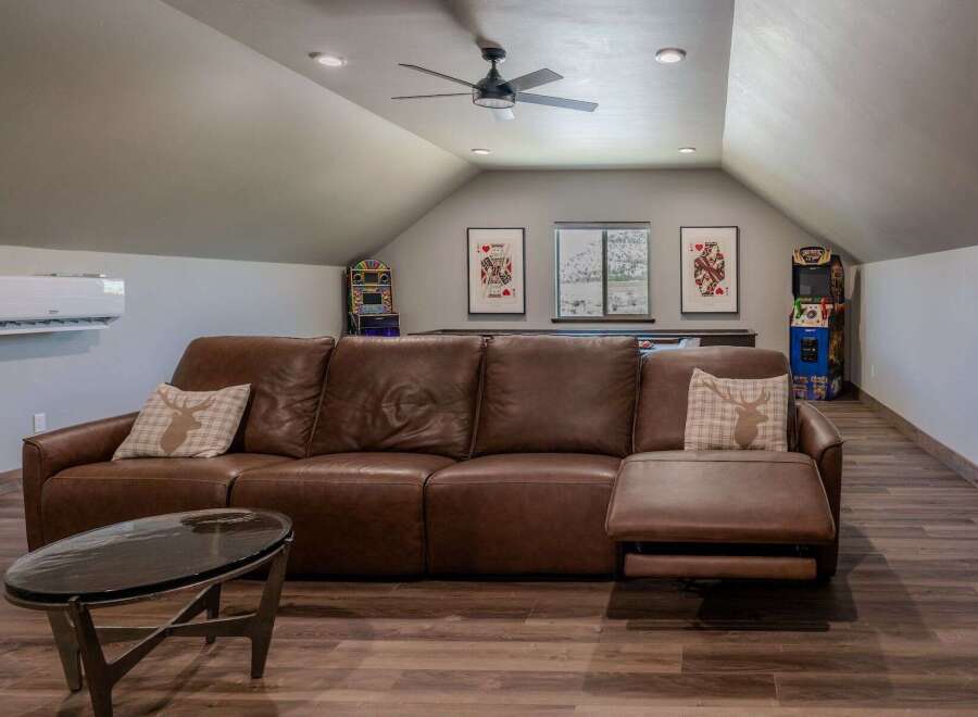 Step into this ultimate game room, perfect for entertaining guests or enjoying a night in.