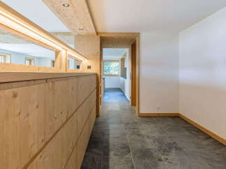 This stunning property showcases a modern interior with a focus on natural materials.