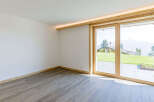 Experience the tranquility of this stunning property, featuring a bright and airy interior with expansive windows.