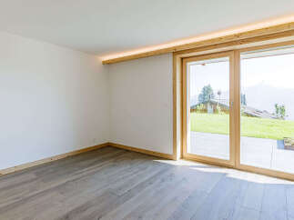 Experience the tranquility of this stunning property, featuring a bright and airy interior with expansive windows.