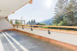 Enjoy breathtaking mountain views from this stunning balcony.