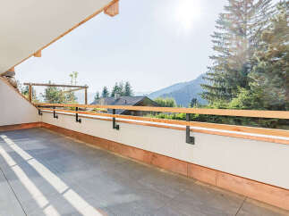 Enjoy breathtaking mountain views from this stunning balcony.
