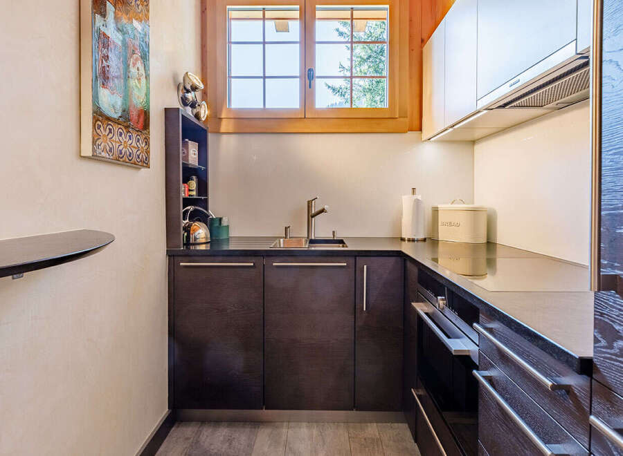 This stunning kitchen boasts modern design and functionality.
