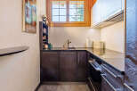 This stunning kitchen boasts modern design and functionality.