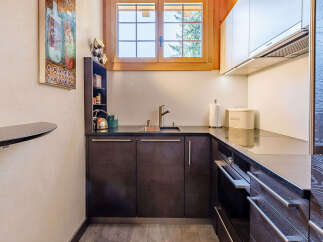This stunning kitchen boasts modern design and functionality.