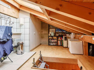 Discover this unique property featuring a charming attic space, perfect for a variety of uses.