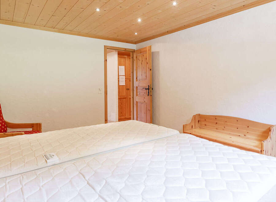 This cozy bedroom features a comfortable bed, perfect for a relaxing stay.