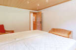 This cozy bedroom features a comfortable bed, perfect for a relaxing stay.