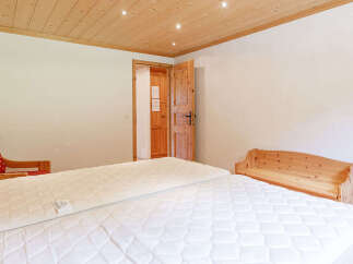 This cozy bedroom features a comfortable bed, perfect for a relaxing stay.