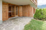 Discover the charm of this property, featuring a beautiful stone patio that leads to a cozy interior.