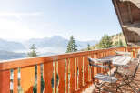 Enjoy breathtaking mountain views from this charming balcony.