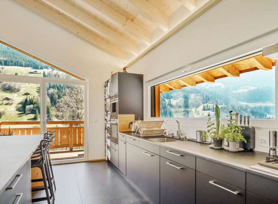 Experience the perfect blend of modern design and natural beauty in this stunning kitchen.