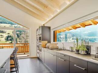 Experience the perfect blend of modern design and natural beauty in this stunning kitchen.