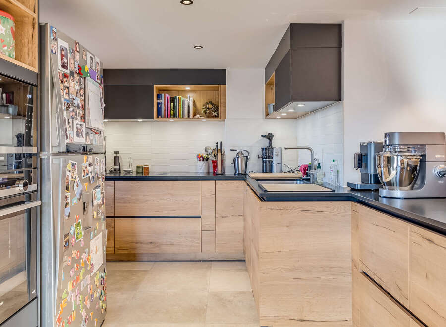 This modern kitchen boasts sleek design and functionality.
