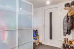 Step into a stylish entryway with ample storage solutions.