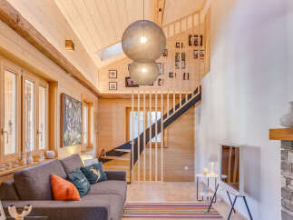 Experience the warmth of this stunning wooden interior, perfect for a cozy living space.