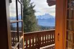 Experience breathtaking mountain views from this charming property.