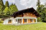 Discover the charm of this stunning chalet nestled in a serene, green landscape.