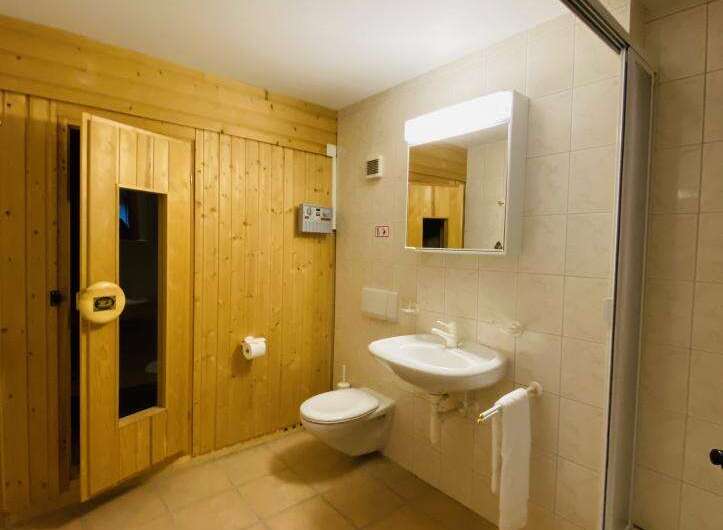 Discover the perfect blend of relaxation and convenience in this stunning bathroom.