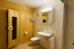 Discover the perfect blend of relaxation and convenience in this stunning bathroom.