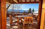 Enjoy breathtaking mountain views from this charming outdoor seating area.