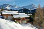 Experience the ultimate winter escape in this stunning chalet nestled amidst snow-capped mountains.