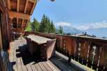 Enjoy breathtaking mountain views from this stunning outdoor deck.