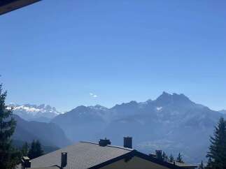 Experience breathtaking mountain views from this stunning property.