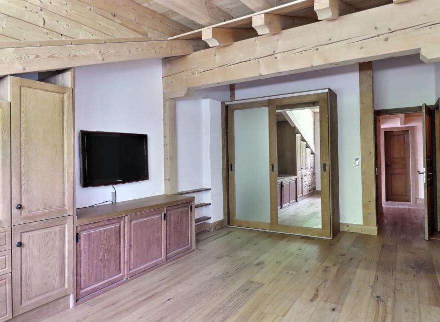 This stunning property boasts a beautifully designed interior with a focus on natural materials.