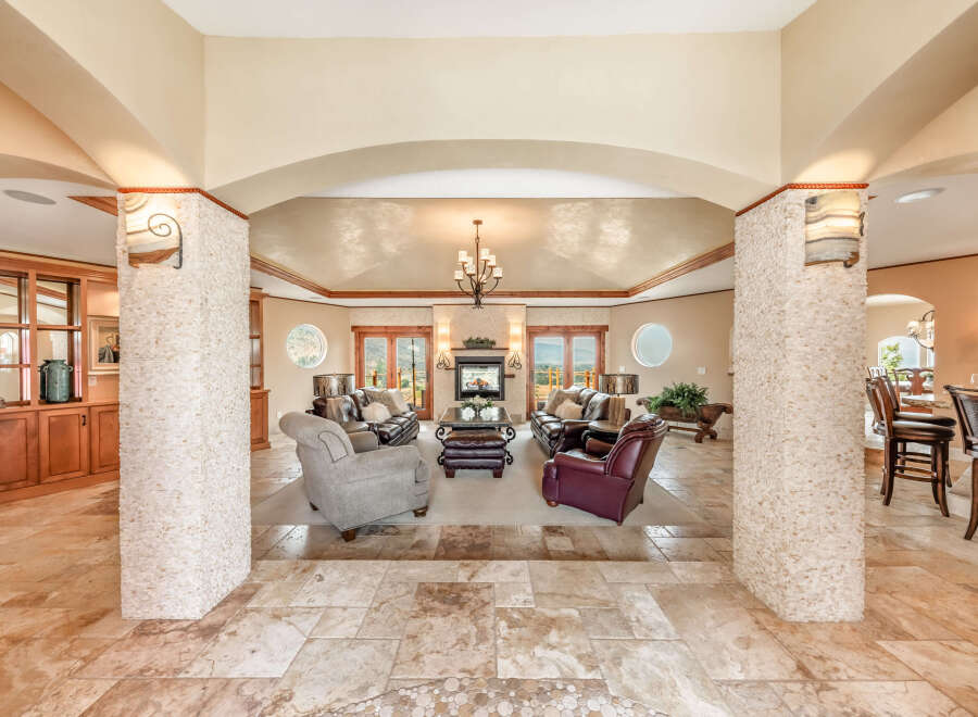Step into luxury with this stunning property, showcasing an open-concept living space perfect for entertaining.
