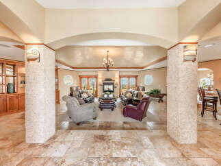Step into luxury with this stunning property, showcasing an open-concept living space perfect for entertaining.
