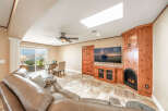 This stunning living space features a cozy fireplace, perfect for relaxing evenings.