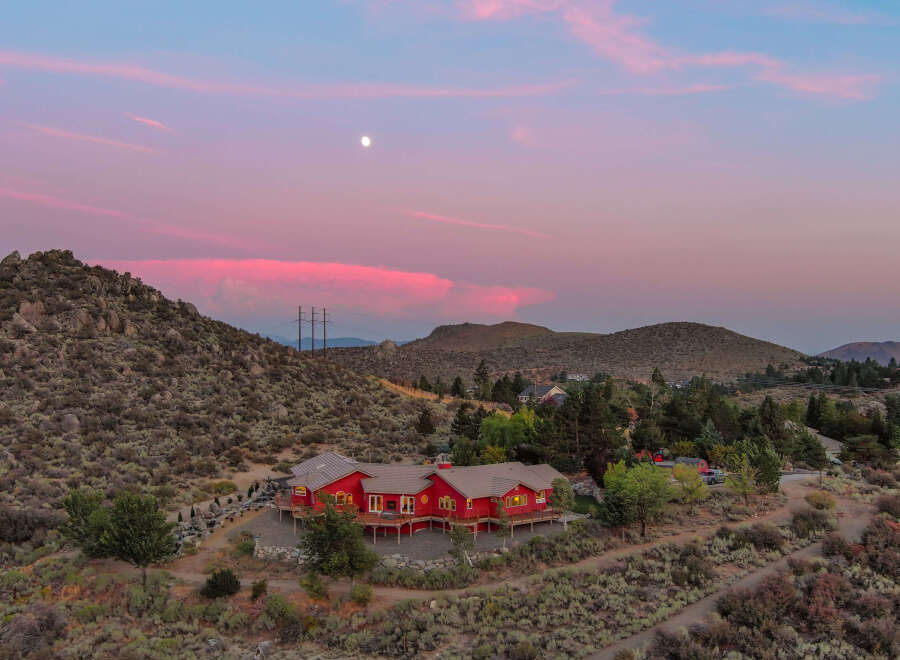 Nestled amidst the serene beauty of the mountains, this stunning property offers a luxurious retreat.