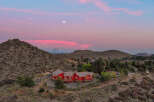 Nestled amidst the serene beauty of the mountains, this stunning property offers a luxurious retreat.