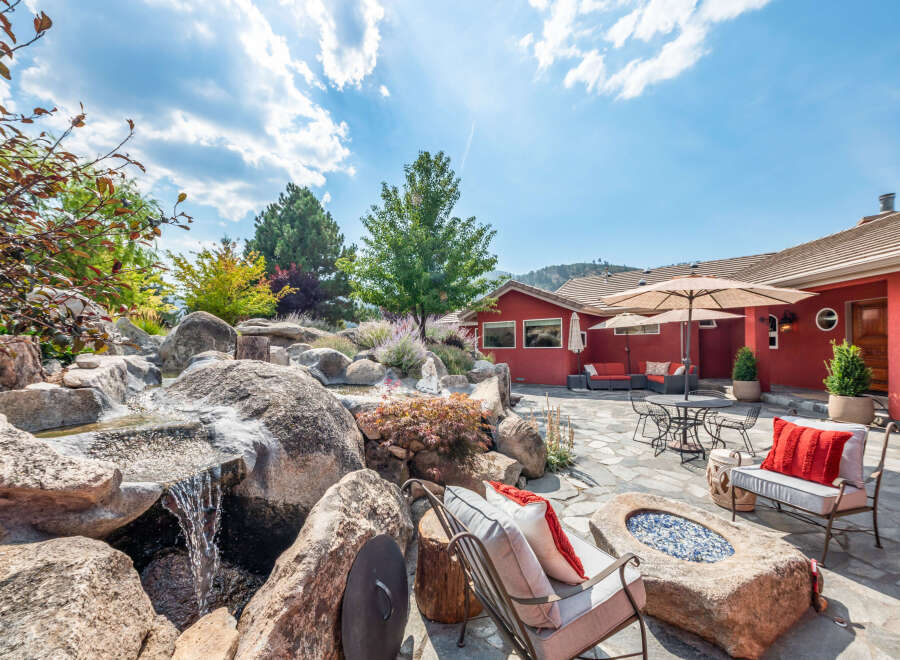 This stunning property boasts a beautifully landscaped backyard oasis, perfect for relaxation and entertaining.