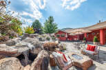 This stunning property boasts a beautifully landscaped backyard oasis, perfect for relaxation and entertaining.