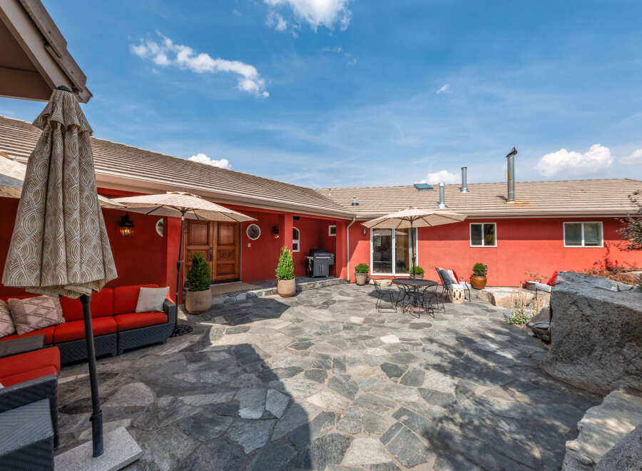 Enjoy outdoor living in this stunning patio space.