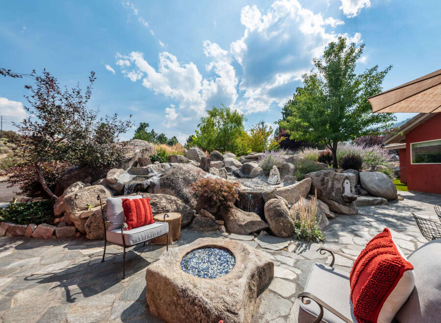 This stunning property boasts a beautifully landscaped backyard oasis, perfect for relaxation and entertaining.