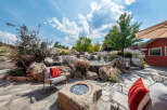 This stunning property boasts a beautifully landscaped backyard oasis, perfect for relaxation and entertaining.
