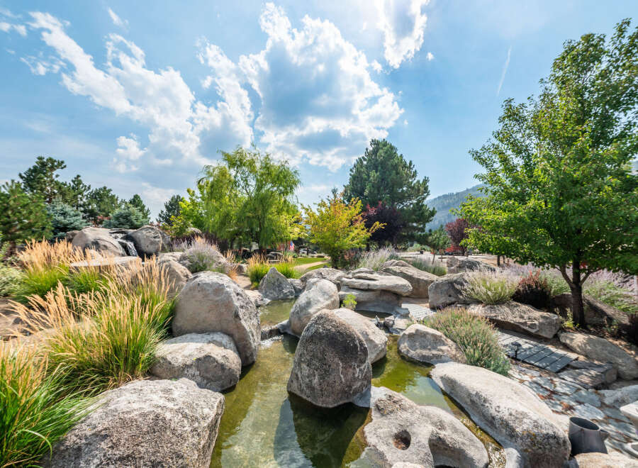 This stunning property boasts a beautifully landscaped outdoor oasis, perfect for relaxation and entertaining.