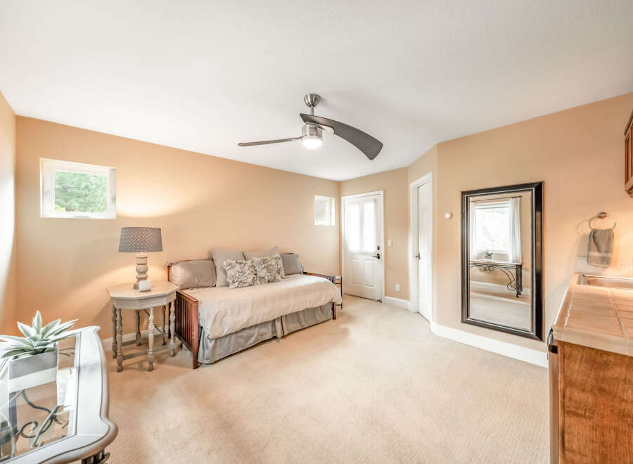This inviting space features a cozy daybed, perfect for relaxation or accommodating guests.